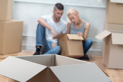 Organized moving boxes ready for flat removals in Fulwell