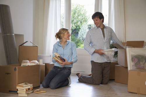 Household furniture and boxes prepared for long-term storage in Fulwell